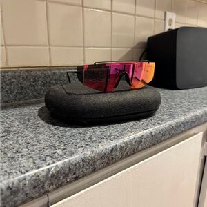 Stylish Black Sunglasses with Pink-Orange Lenses